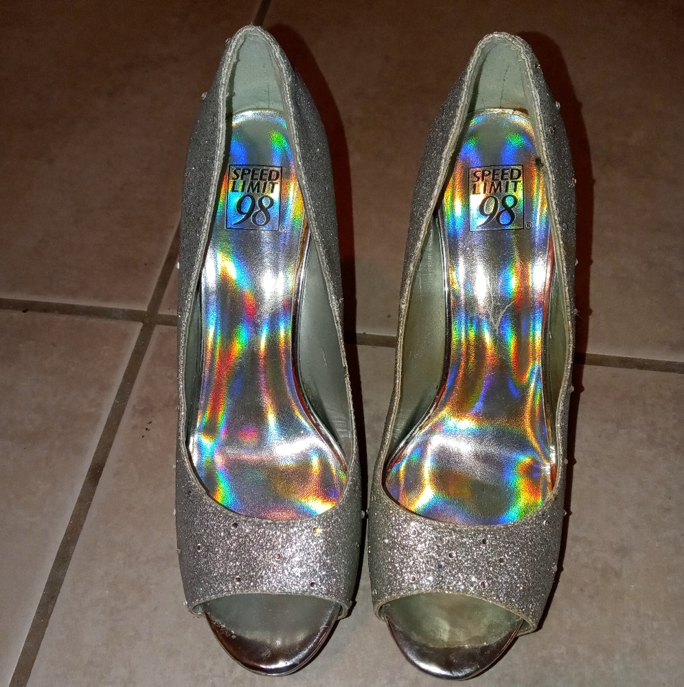 Used silver peep toe heels